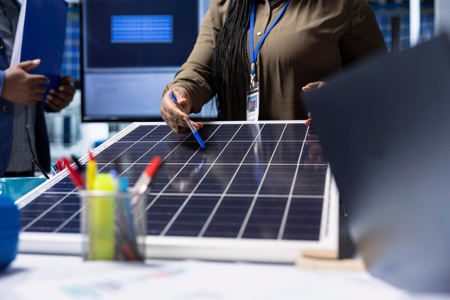 shareholders-meet-with-industrial-plant-manager-review-solar-panel-components_482257-126504